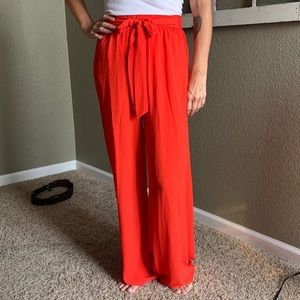 NWOT VICI small orange flowy wide leg pants
